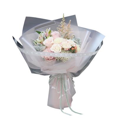 China Custom Plastic Florist ANTISTATIC Bouquet Flower Paper Gift Glitter Wrapping Paper From Shinewrap China for sale