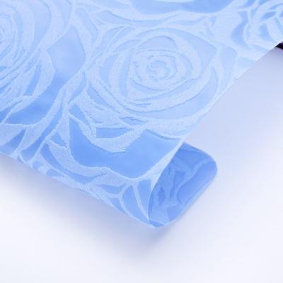 China Shinewrap Rose Pattern Korean Waterproof Sky Blue Wrapping Paper for Bouquets for sale