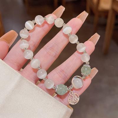 China CLASSIC light luxury beaded decoration elastic minority rope women's blessing fashion opal bracelet for sale