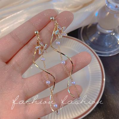 China Fashionable female temperament pearl long tassel long tassel personality earring exquisite advanced fashionable ear studs for sale