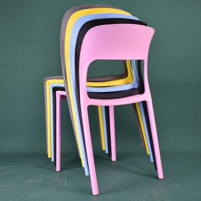 China Cheap Colorful British Convertible Plastic Design PP Chairs Monoblock Patchwork Designers Frames Relaxing Restaurant Supply for sale