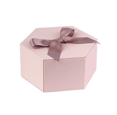 China Handmade Surprised Custom Mystery Hexangon Pink Cardboard Flower Gift Packaging Paper Box With Bow for sale