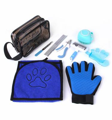 China Stocked Pet Supplies Multifunctional shower grooming set cats and dogs 9 in 1 grooming set with a bag for sale