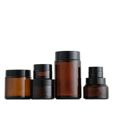 China Wholesale 10g 20g 50g Amber Glass Jar Dark Brown Color Cosmetic Glass Jar Cosmetic Cream Packaging With Black Plastic Caps for sale