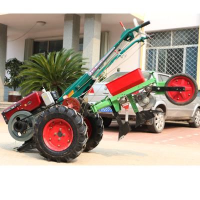 China Tiliing walking weeding ridger planter corn fertilizer tractor with corn seeder a to z company cultivator for sale