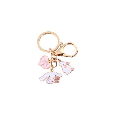 China Custom Made Cherry Blossom Rabbit Key Chain Garland Cat Metal Car Key Chain Female Girlfriend Pendant Gift for sale