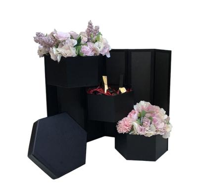 China Handmade Low Price Three Layers Flower Gift Rotating Hexagonal Package Box With Lid for sale