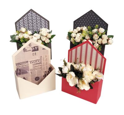 China Handmade Wholesale Low Price Wrap Shape Handle Floral Display Package Boxes In Stock for sale