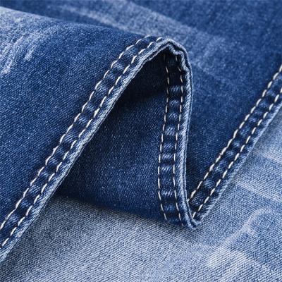 China Shrink-Resistant Hot Sale Cotton Spandex Polyester Blue Stock Denim Fabric for sale