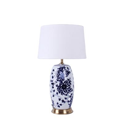 China Amazon blue living room porcelain traditional warm Chinese style ware villa hand-painted and white decorative ceramic table lamp for sale