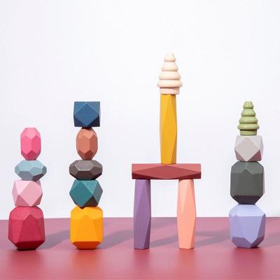 China Educational Toy 16pcs Pinewood Colorful Wooden Puzzle Blocks Baby Building Block Stacked Wooden Stones for sale