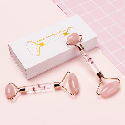 China Whitening Dry Flower To Infuse New Design Skin Care Massage Tool Rose Quartz Jade Roller For Face Angi Aging for sale