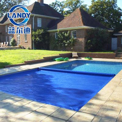 China PVC Child Safety Automatic Locking Pool Cover With Steps For Use In Underground Swimming Pools for sale