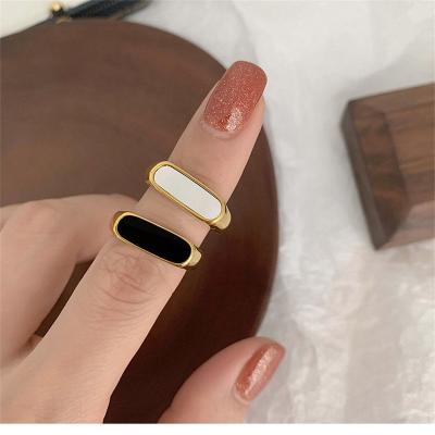 China TRENDY Tarnish Free Tasty 18K Gold Plated White Black Enamel Shell Finger Ring Waterproof Jewelry White Shell Rings Stainless Steel for sale