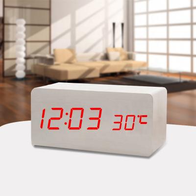 China Antique Style Radio Charging Sound Control And Temperature Display Table Clock Wooden Digital Alarm Clock for sale