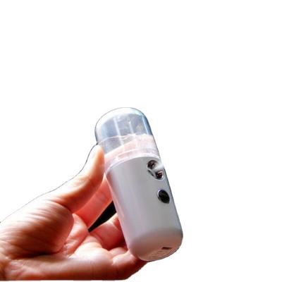 China Mini Nano Sprayer Moisturizer Face Humidifier Electric Nano Facial Steamer Large Ionic Water 30ml Tank for sale