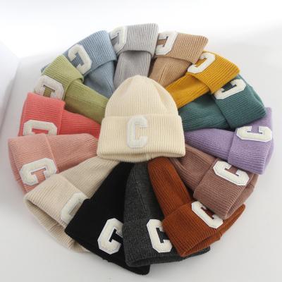 China Wholesale Letter C Letter C Sweater Hat Label Student Solid Color Female Warm Korean Knitted Hat Autumn And Winter New Woolen COMMON Hat for sale