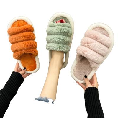 China CUSHIONING 2021 new foreign trade foreign trade female caterpillar word couple's autumn and winter slippers cotton slippers home wool couple for sale