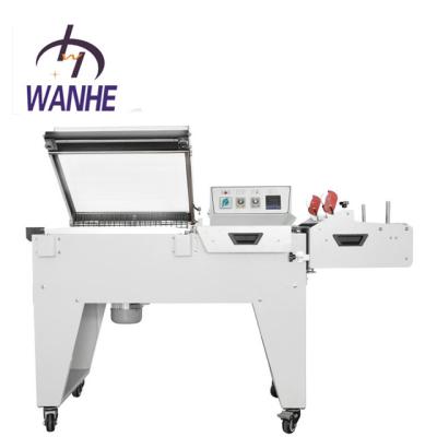 China Automatic Food Wanhe Wrap PE Cling Film Heat Tube Cutting Shrink Wrapping Machine for sale