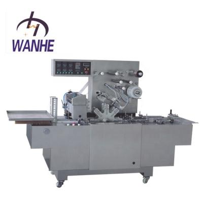 China WANHE BT 350 High Speed ​​3D Food Biscuit Box Wrapping Bopp Gold Tear Strip Automatic Poker Box Cash Book Cellophane Wrapping Machine for sale