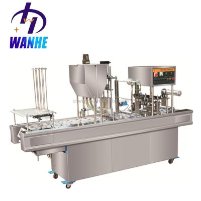 China WANHE Full Automatic Beverage Water Cup Filling and Liquid Popcorn Nut Juice Cup Jelly Fills and Sealing Machine for sale