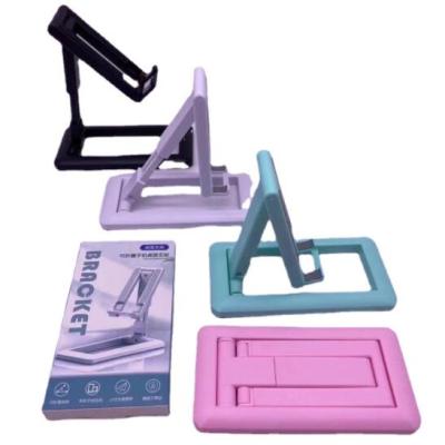 China Promotion Gift Plastic Colorful Mobile Phone Holder Plastic Colorful Tablet Stand Price Folding Adjustable Tabletop Mobile Phone Stand for sale