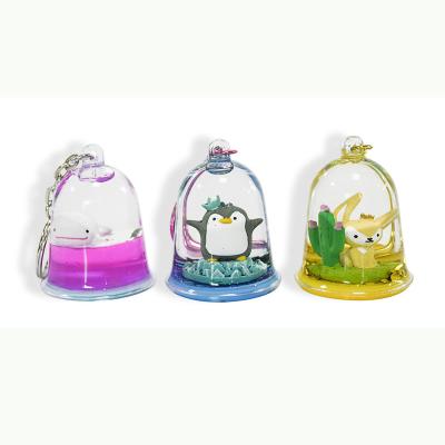 China Novelty Waterproof Floaty Pendant Motion Mini Sparkle Bubble Floating Liquid Key Chain for sale