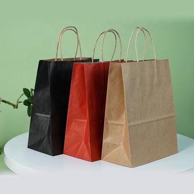 China Recycled Colored Materials Kraft Paper Bags With Handles For Gift Food Paper Gift Soft Shopping Bags for sale