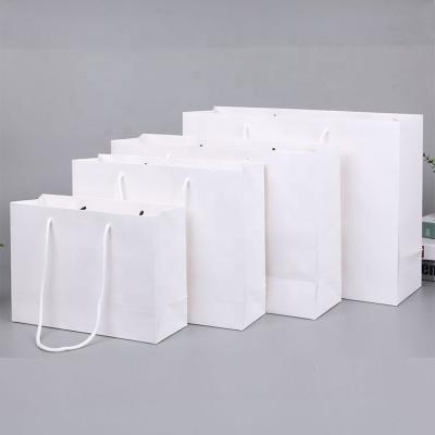 China Recycled Materials White Shopping Paper Bag Printed Custom Logo With Handles for sale