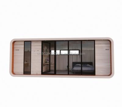 China 20ft Modern Seaside Holiday Special Shaped Wooden House One Family Living Quick Setup Hotel for sale