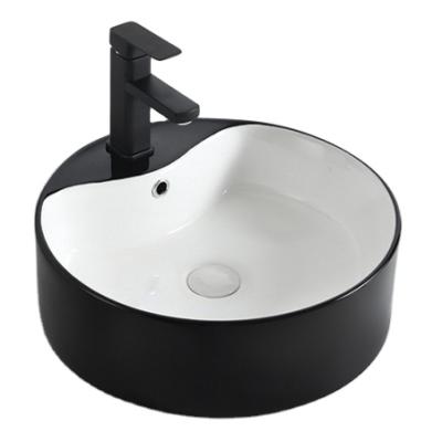 China Modern Bathroom Gx2012 Round Shape White Ceramic Hand Wash Single Hole Glossy Black Basin Australia Sink Ivory Cheap Basin for sale