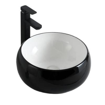 China Modern Cheap Price Gx2165 White Color Ceramic Hand Wash Sink No Holes Round Glossy Black Art Basin Big Lavabo Sizes for sale