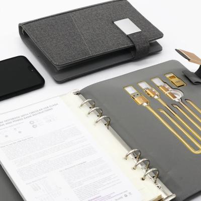 China 8000mAh PU Leather Magnetic Advanced Loose Leaf Bnding Organizer With Power Bank Desktop Notebook for sale