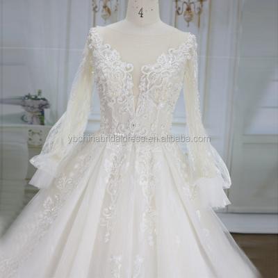 China Gorgeous Anti-Static Deep V Neckline With Heavy Lace Beads Long Sleeve Weddingdress for sale