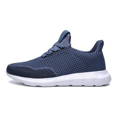 China Big Size Round Fly Knit Mesh Fabric Casual Sports Jogging Shoes Unisex Breathable Sneakers for sale