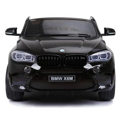 China Ride On Licensed Toy 2021 BMW X6M Electric Car Kids Remote Cars For Kids 12v Kids Ride On Car for sale