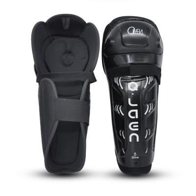 China Universal Sizes All Black Professional PE Shell Sports Ice Hockey Protector Hard Shin Guards Shin Pad for sale