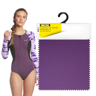 China Workable ODM OEM Customized Color Polyester Spandex Scuba Knit Quick Dry Elastic Plain Dyed 4 Way Stretch Air Layer Fabric For Swimwear for sale