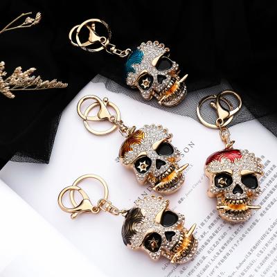 China New European and American sports diamond skull hip hop car bag factory direct sales creative three-dimensional pendant metal key chain for sale