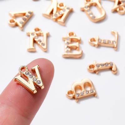 China Cute hot gold pendant diykc letter english letter diykc diamond 26 alloy pendant accessories for sale