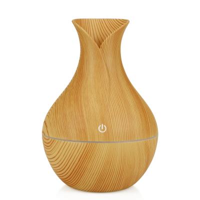 China Wholesale 130mL Ultrasonic Grain Essential Oil Diffuser 7 Color Light Ultrasonic Home Car USB Mini Air Conditioner Humidifier Wood Car for sale