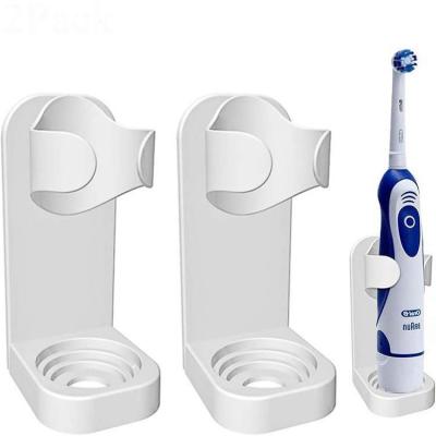 China Electric Toothbrush Body Wall Mounted Base Toothbrush Organizer Electric Toothbrush Holder Viable Adhesive Holder for sale