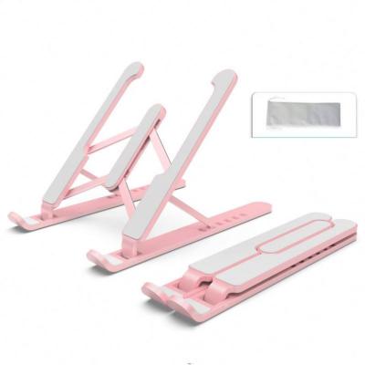 China Plastic Laptop Portable Stand Ergonomic Foldable Notebook Stand For Business Man for sale