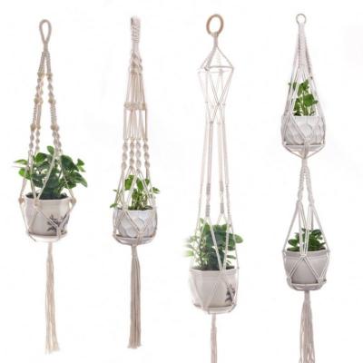 China Outdoor Multi Style Woven Hanging Flower Pot Hang Up Road Slide Plant Hanger Cotton Twine Basket Hemp Rope Planter Pot for sale