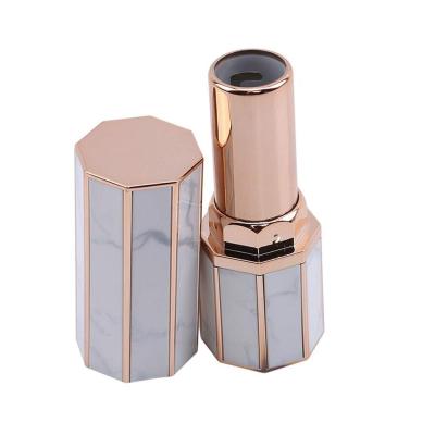 China Beauty DIY Effect Cosmetics White Marble Empty Lipstick Tubes Plastic Lip Balm Containers for sale