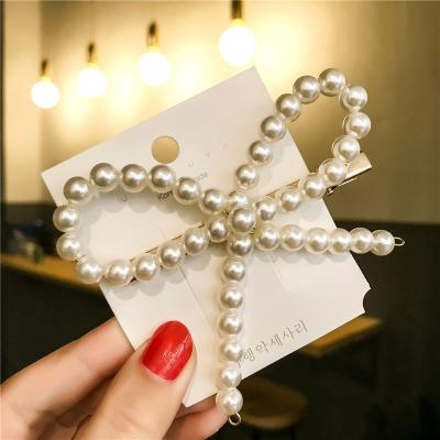 China 2019 Fashion Trendy Pearl Hair Clip For Women Elegant Design Barrette Stick Gold Metal Alloy Snap Hair Clip for sale