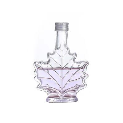 China Best Beverage Price 50ml 100ml Maple Wine Glass Crystal Bottle With Metal Screw Top For Brandy And Juniper for sale