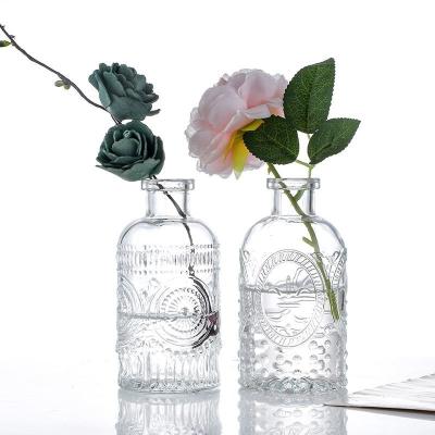 China Gift & 2023 Hot Selling Empty Round Craft Flower Vase 200ml Aromatherapy Bottle Glass Bottle Decoration for sale