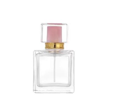 China 50ml 100ml Perfume Spray Bottle Glass Perfume Cosmetic Hot Selling Transparent Square Bottles for sale