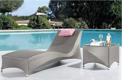 China Silver Single Rattan Chaise Lounge Outdoor Wicker Sunbeds With Pillow for sale